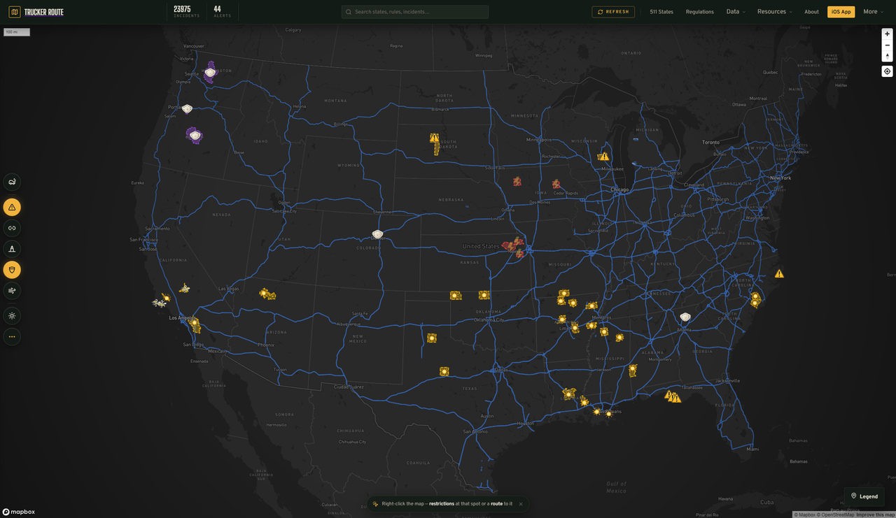 Trucker Route hazard map of the United States showing live incident, wildfire and weather markers on the interstate network